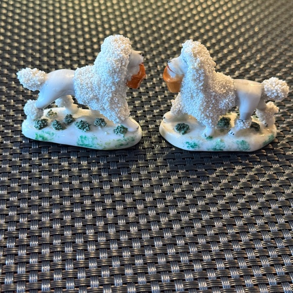 Two vintage porcelain Staffordshire poodles stamped Germany w/ gold gilt anchor